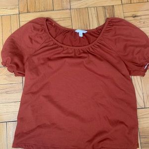 Orange Lauren Conrad top with puff sleeves